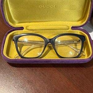 Gucci Women's Black and Gold Glasses